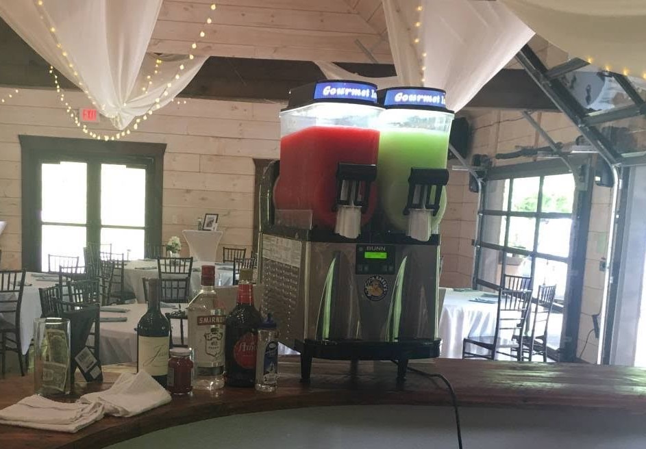 a group of friends making a toast with cooldaddys slushies 